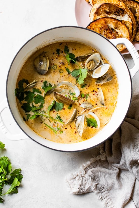 Asian Coconut Broth Clams made with lemongrass, ginger and cilantro is wonderful when paired with bread for dipping all that delicious broth!