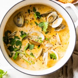Asian Coconut Broth Clams made with lemongrass, ginger and cilantro is wonderful when paired with bread for dipping all that delicious broth!