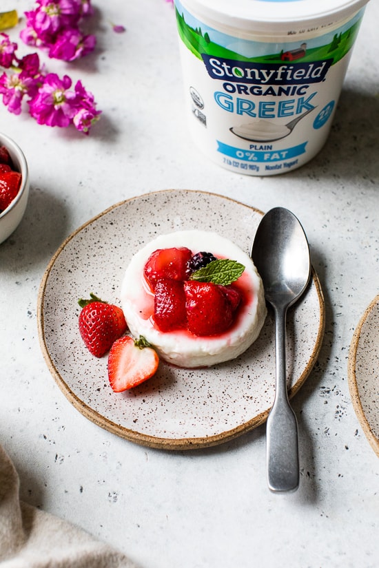 This simple Yogurt Panna Cotta is the perfect smooth, creamy dessert. The cool tang of yogurt pairs perfectly with fresh berries. To macerate the berries simple mix them with a little sugar and let them sit.