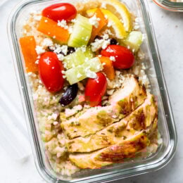 Bring the flavors of the Mediterranean to work with these Greek Chicken Meal Prep Rice Bowls – the perfect recipe to make ahead!