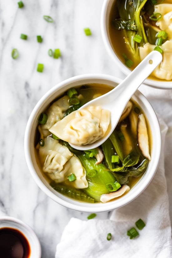 Loaded with vegetables, this quick and easy wonton soup is super simple, and takes under 15 minutes to make thanks to the frozen wontons.