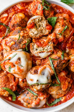 Cheesy Turkey Meatballs covered in sauce and cheese, made all in one skillet, serve this with a green salad and a little bread on the side for dipping!