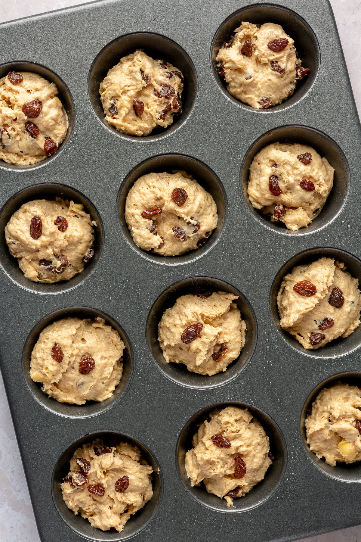 irish soda bread dough in muffin tin