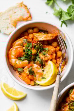 This easy Harissa Shrimp and Chickpea dish is super fast, made all in one skillet, and takes under 10 minutes to make. A great way to use pantry and freezer staples.