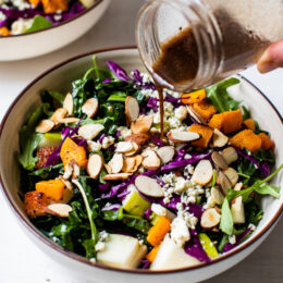 Immune-boosting kale, squash, purple cabbage, arugula, almonds, basil and pears are all tossed in a tangy-sweet dressing. To add more protein, you could add grilled shrimp or salmon.