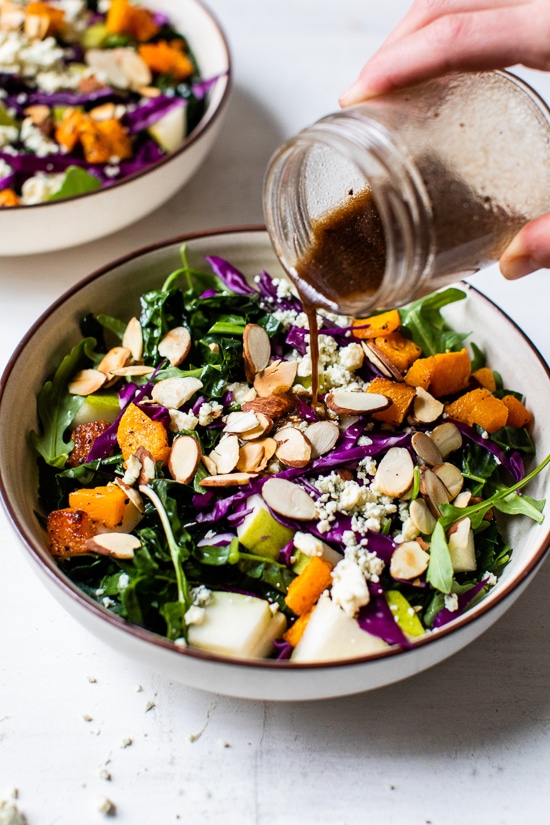 Immune-boosting kale, squash, purple cabbage, arugula, almonds, basil and pears are all tossed in a tangy-sweet dressing. To add more protein, you could add grilled shrimp or salmon.
