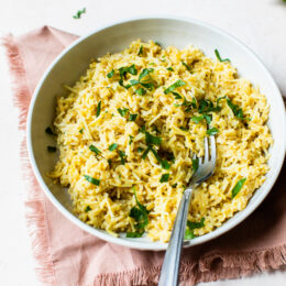 This simple rice pilaf with brown rice and angel hair pasta is a healthy, homemade version of Rice-A-Roni that makes the perfect side dish.