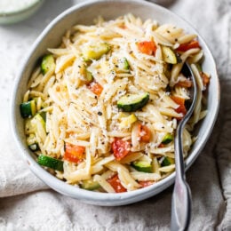 Orzo with Zucchini and Tomato is a quick and easy side dish that goes great with chicken, pork chops, or double the portion and enjoy it as a main dish.