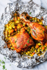 These easy 5-ingredient BBQ Chicken Foil Packets can be baked in the oven or made on the grill! An easy meal-in-one and the best part, easy cleanup!