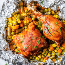 These easy 5-ingredient BBQ Chicken Foil Packets can be baked in the oven or made on the grill! An easy meal-in-one and the best part, easy cleanup!