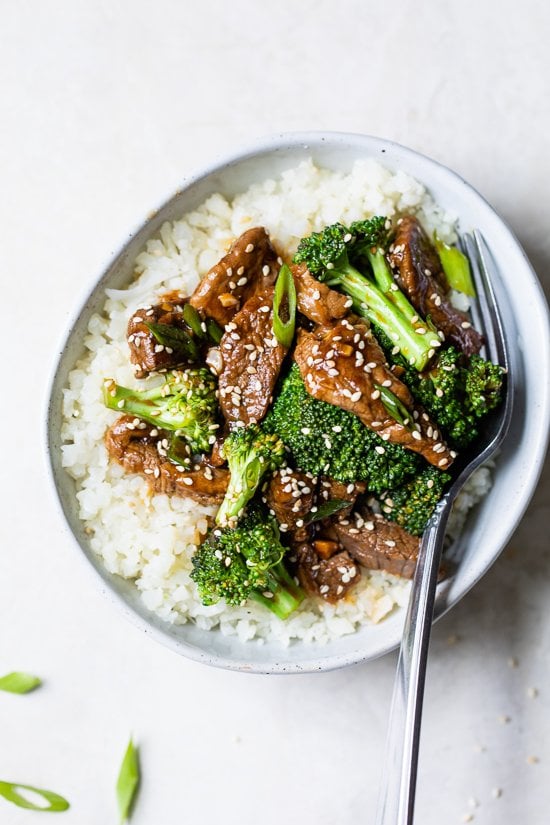Beef and Broccoli in a bowl over rice
