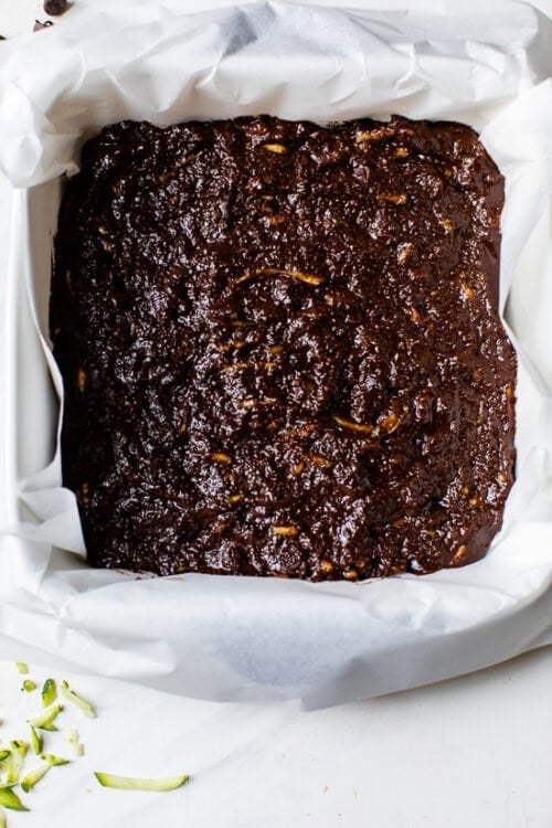 Zucchini brownie batter in a baking pan