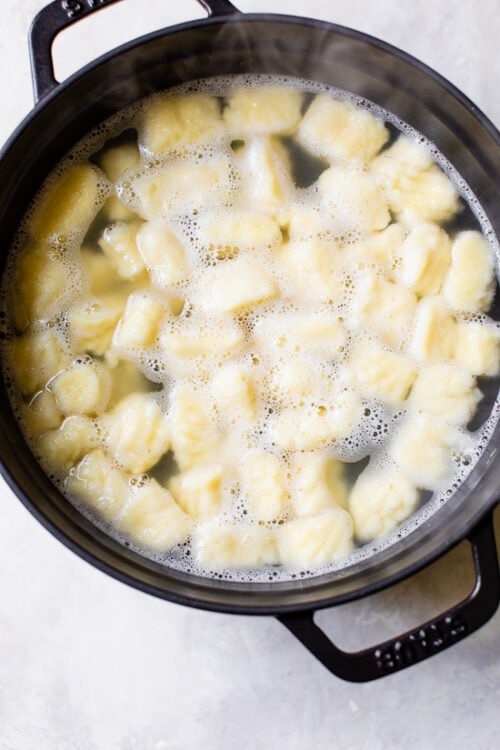 gnocchi boiling in a pot of water