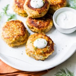 These low-carb Salmon Croquettes with Dill Sauce are healthier than traditional deep-fried ones and use only egg as a binder rather than breadcrumbs or crackers.