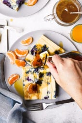 Lemon Blueberry Buttermilk Sheet Pan Pancakes on a plate with syrup.