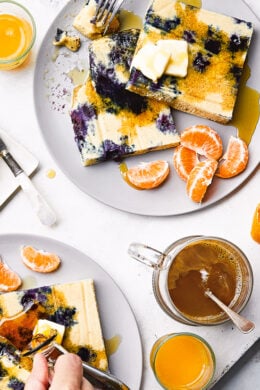Lemon Blueberry Buttermilk Sheet Pan Pancakes on two plates.