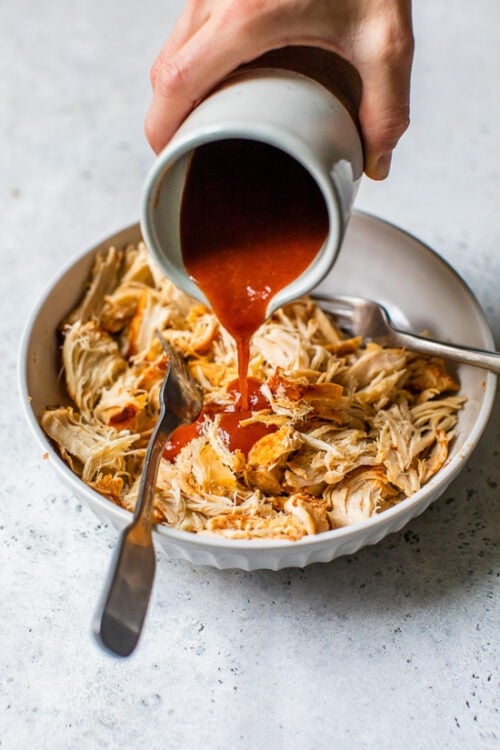 shredded chicken with enchilada sauce.