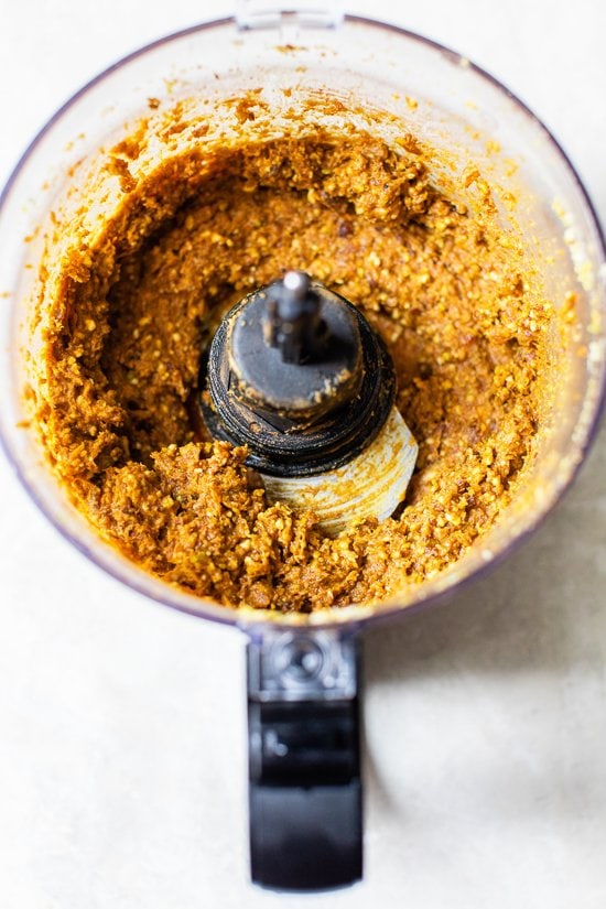 Made with cashews, pistachios, dates, pumpkin and spices, these no-bake Pumpkin Pistachio Energy Balls taste like little bites of pumpkin pie. Pumpkin pistachio energy ball ingredients in a food processor