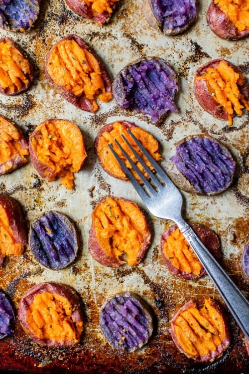 mashing sweet potato with a fork