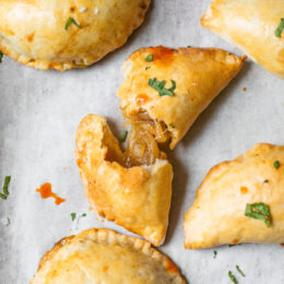 Chilean empanadas with hot sauce