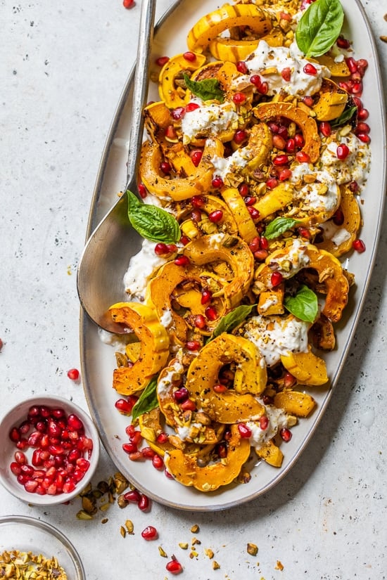 Roasted Delicata Squash with Burrata, Pomegranate and Pistachios