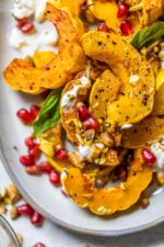 Roasted Delicata Squash with Burrata, Pomegranate and Pistachios