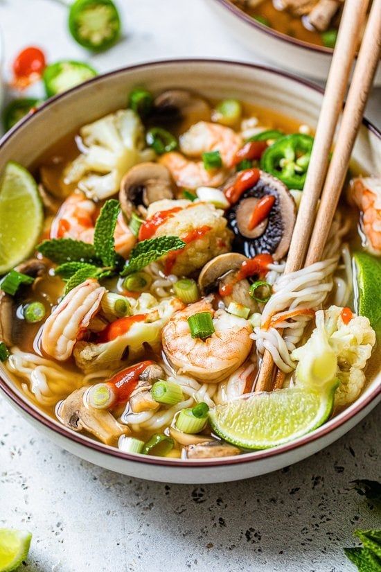 Shrimp noodle soup with chopsticks