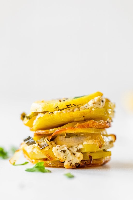 Close-up of layered Pommes Anna potato cups.