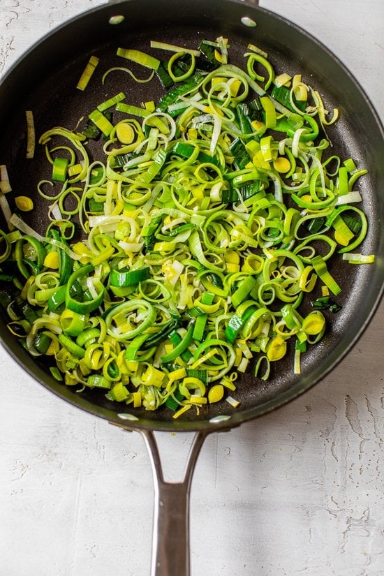 Sauté the leeks until tender and lightly golden
