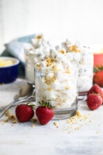 Ambrosia salad in 3 glass serving containers.