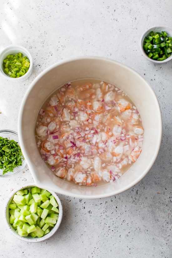 Marinate shrimp in lime juice.