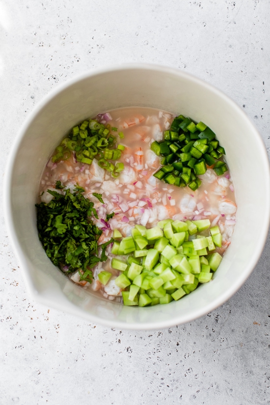 Add cucumbers, jalapeno, scallion and cilantro