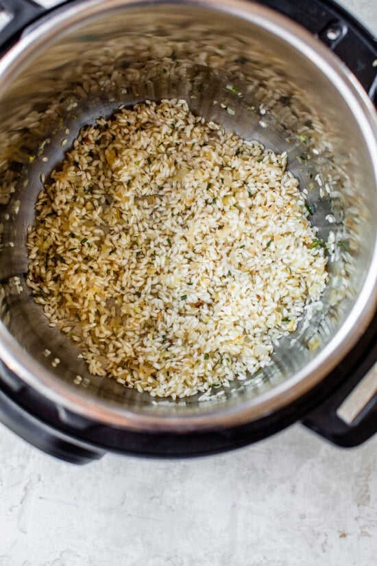 This Instant Pot Risotto recipe is the quickest, easiest way to make risotto. Perfectly creamy every time and it's ready in just 20 minutes. Risotto in the instant pot