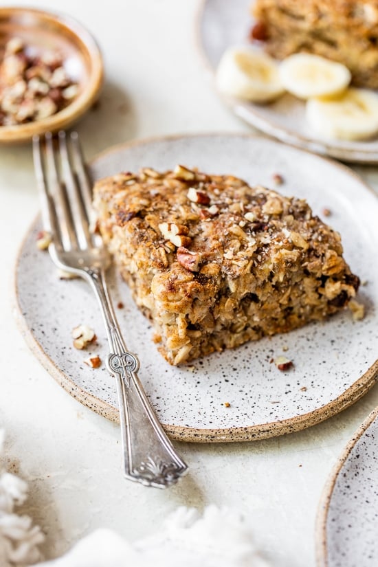Banana Bread Baked Oatmeal in the Instant Pot? Yes! This oatmeal bars recipe makes an easy breakfast, brunch, or snack. Instant Pot Oatmeal Bar on a plate