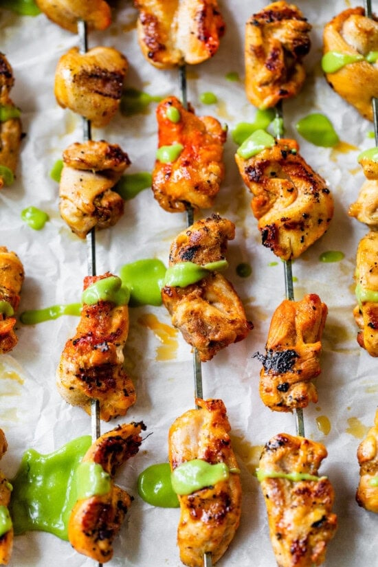 Peruvian Grilled Chicken skewers with avocado aji sauce