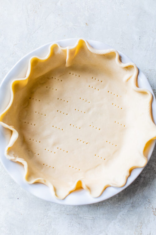 prick pie crust with fork