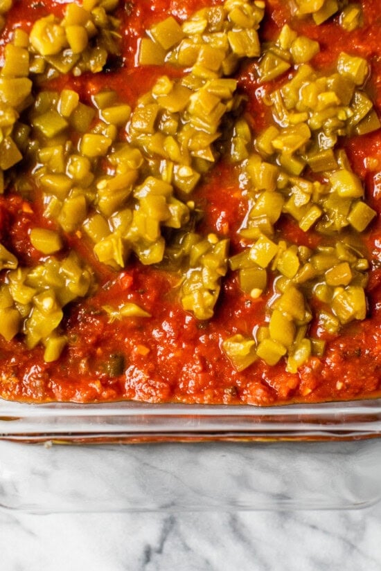 Top with salsa and green chilies