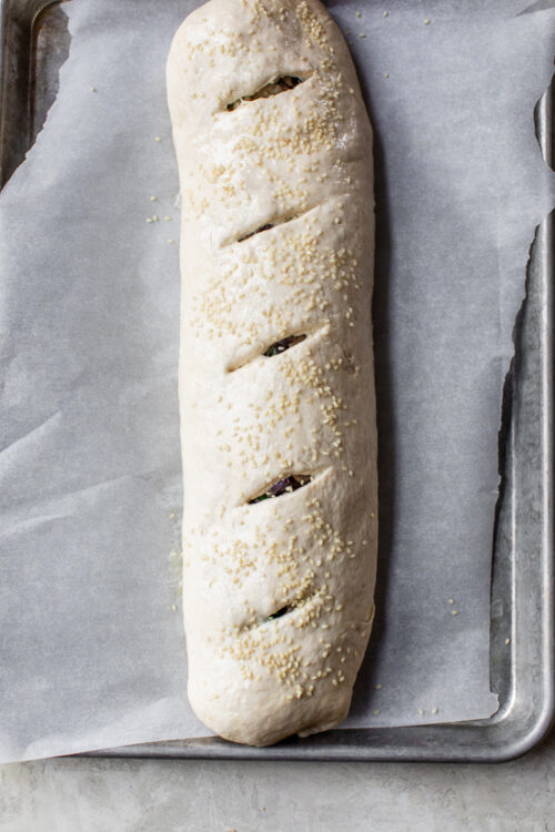 Cur small slits on stromboli dough