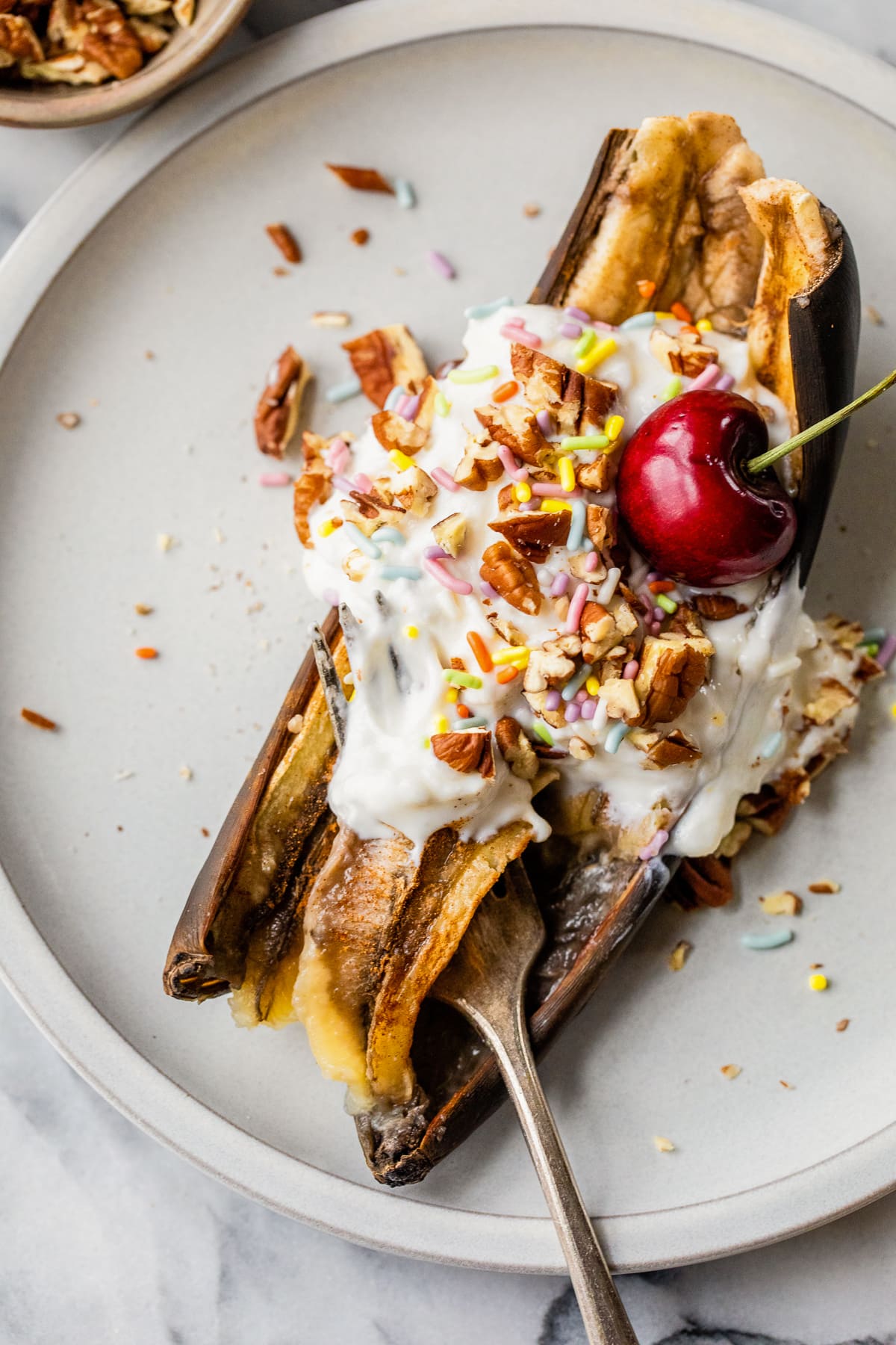 Air Fryer Banana with yogurt, cherry and sprinkles