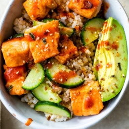 Roasted Salmon Rice Bowls with avocado and cucumber