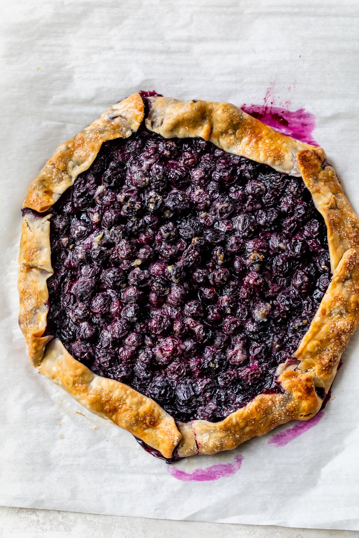 This easy blueberry galette is the perfect dessert to bake when blueberries are in season. Using refrigerated pie dough makes it even faster! Blueberry Tart