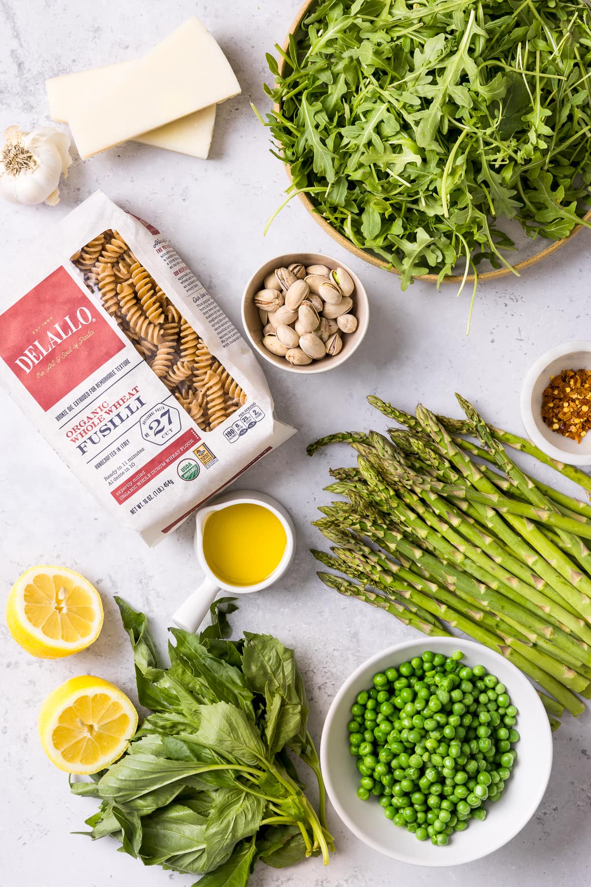 Pasta with Arugula, Asparagus, Peas, Olive Oil and Pistachios