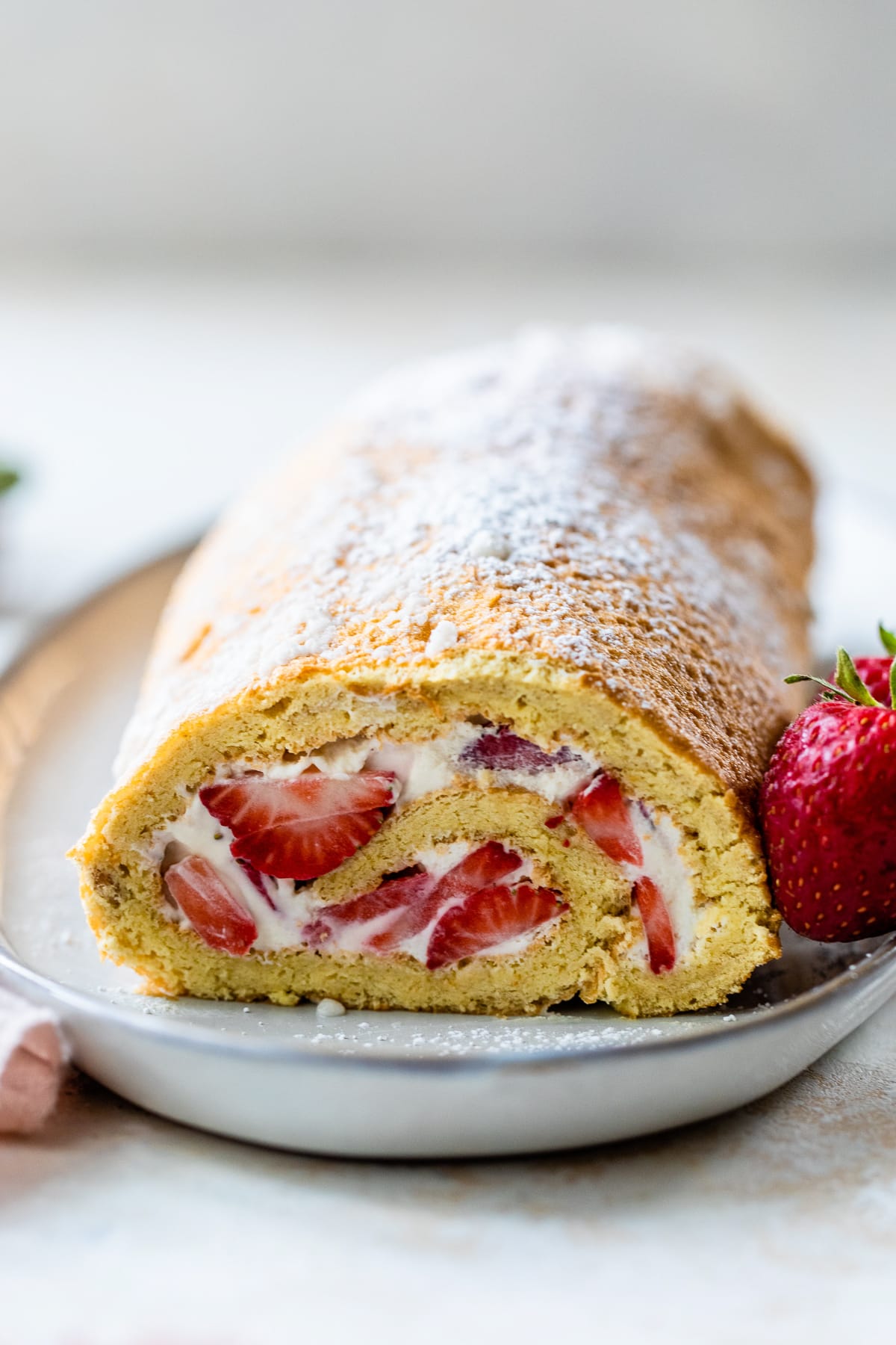 Strawberry Swiss Roll on a plate 