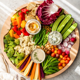 Overhead view of veggie tray with dips