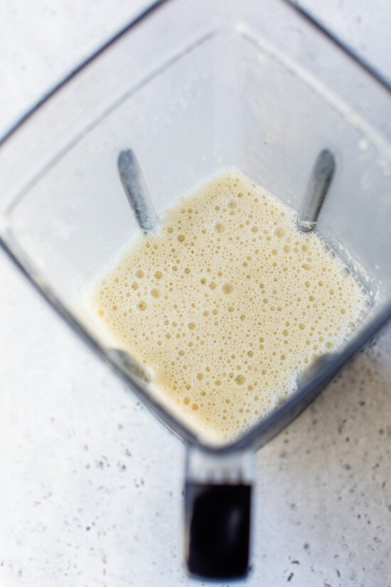 flour in blender with broth