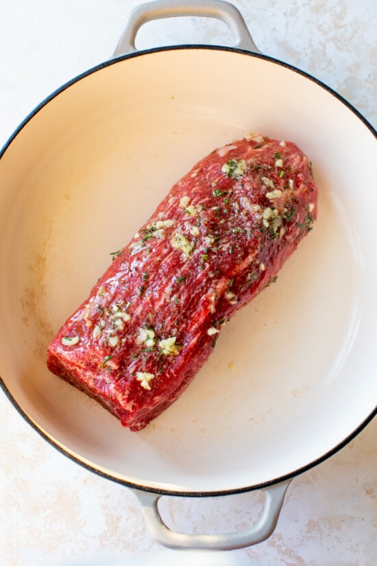 eye of round roast with garlic, rosemary and oil