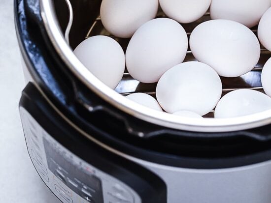 When it comes to making deviled eggs, I keep my ingredients pretty classic, but I love adding little pickle juice to my the yolks for a pop of flavor! Making hard boiled eggs in the Instant Pot will give you perfect, easier to peel eggs every time.