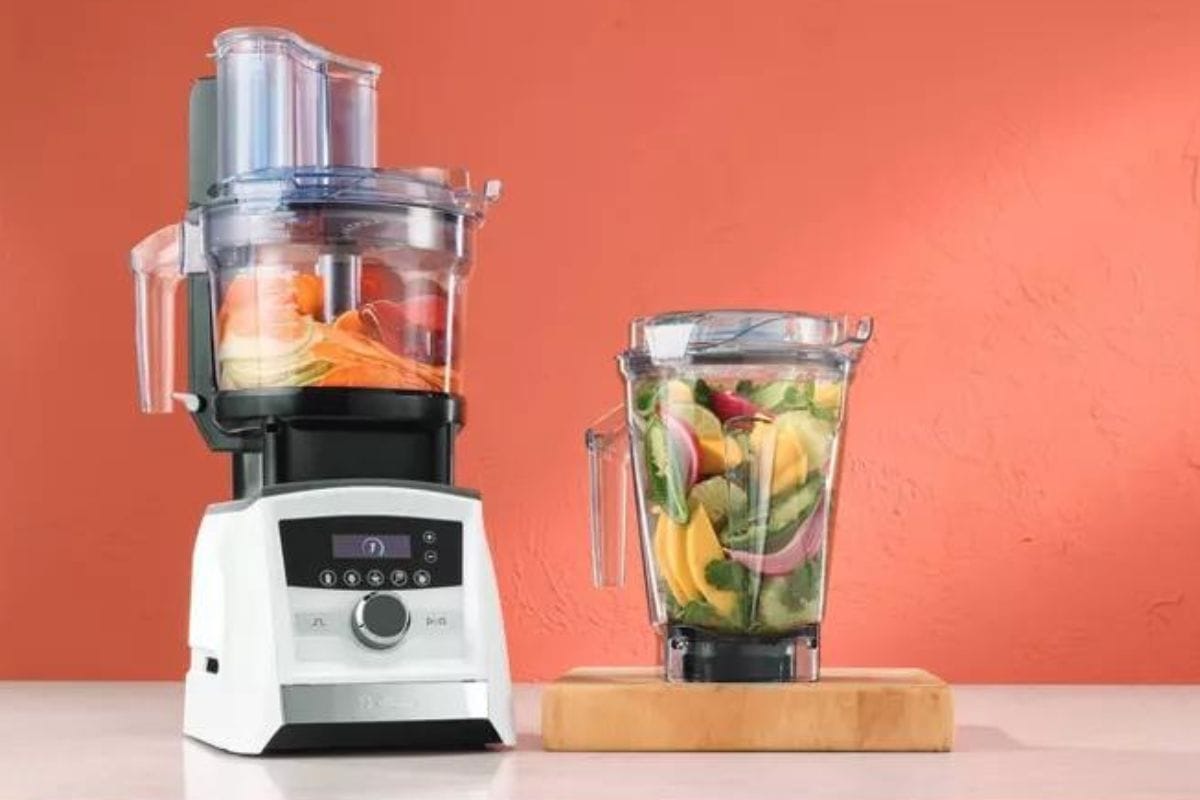 Vitamix A3500 SmartPrep Kitchen System on orange background