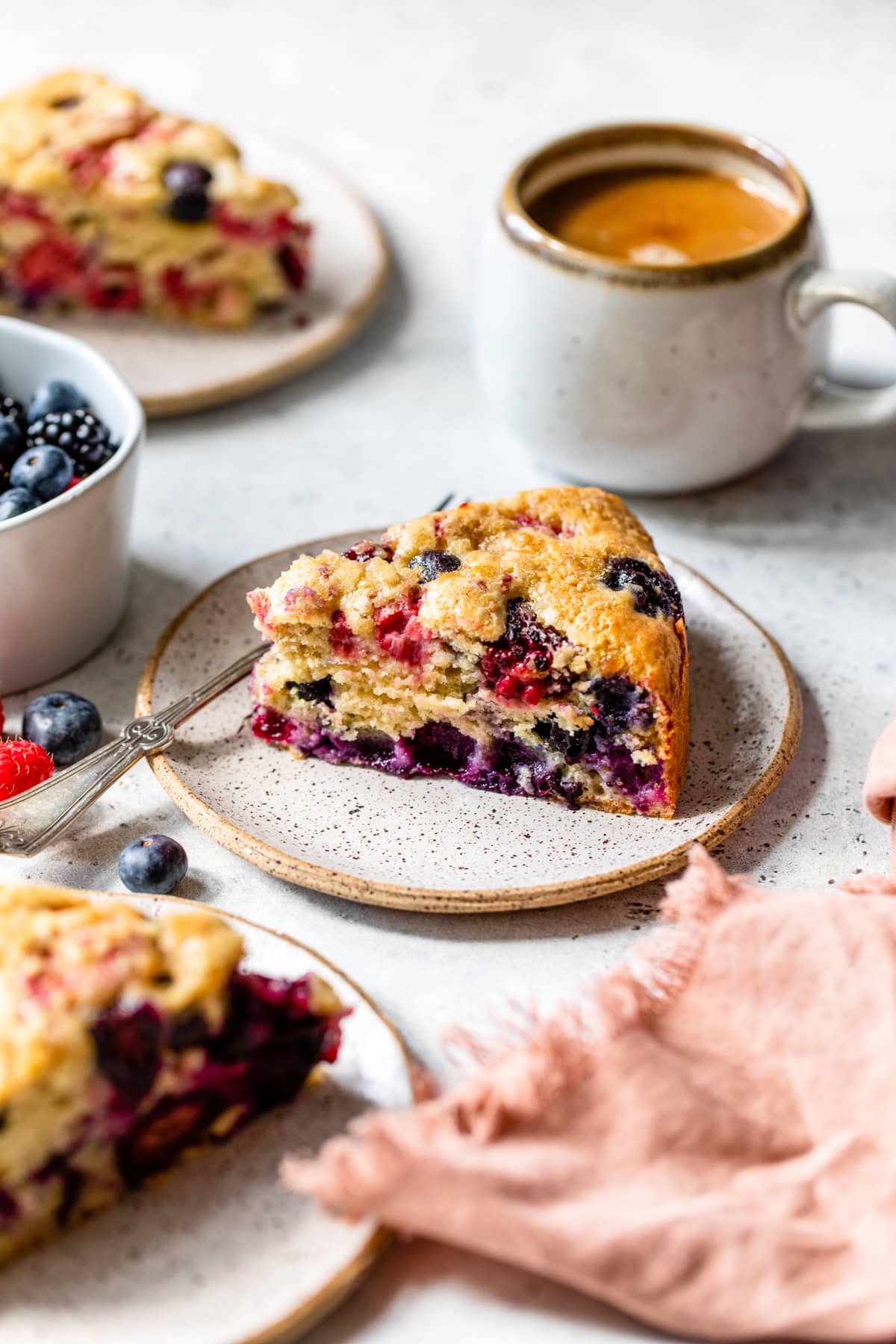 plates of Berry Buckle with coffee