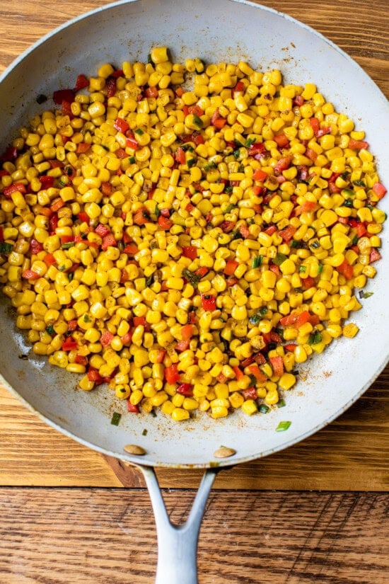crab and bell peppers in a skillet